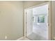 Bright hallway with view to another living area at 7430 Weeping Willow Dr, Sarasota, FL 34241