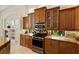 Stylish kitchen with ample counter space and wood cabinets at 7167 Whitemarsh Cir, Lakewood Ranch, FL 34202