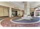 Elegant lobby with stone flooring and seating area at 100 Central Ave # H716, Sarasota, FL 34236