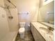 Bathroom with shower, toilet and granite countertop at 2687 Golf Course Dr # 219, Sarasota, FL 34234