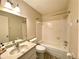 Bathroom with tub, shower, and granite countertop at 2687 Golf Course Dr # 219, Sarasota, FL 34234