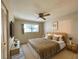 Main bedroom with king-size bed and wood flooring at 2687 Golf Course Dr # 219, Sarasota, FL 34234