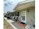 Exterior view of condo showing front door and walkway at 2687 Golf Course Dr # 219, Sarasota, FL 34234
