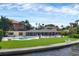 Home with pool and patio overlooking the water at 1701 Sandalwood Dr, Sarasota, FL 34231