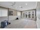 Unfinished basement with large doors and water access at 1701 Sandalwood Dr, Sarasota, FL 34231