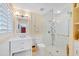 Modern bathroom with white subway tiles and glass shower at 1701 Sandalwood Dr, Sarasota, FL 34231