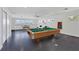 Game room with pool table and water views at 1701 Sandalwood Dr, Sarasota, FL 34231