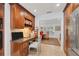 Kitchen workspace with built-in desk and granite countertops at 1701 Sandalwood Dr, Sarasota, FL 34231