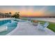 Modern pool and spa with sunset view at 1701 Sandalwood Dr, Sarasota, FL 34231