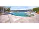 Freeform pool with spa and waterfront views at 1701 Sandalwood Dr, Sarasota, FL 34231