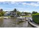 Boat lift and waterfront property at 1701 Sandalwood Dr, Sarasota, FL 34231