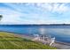 Relaxing waterfront view with patio chairs at 1701 Sandalwood Dr, Sarasota, FL 34231