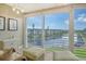 Relaxing living room with stunning water views at 4350 Chatham Dr # E307, Longboat Key, FL 34228