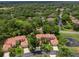 Aerial view of home in a lush, wooded community at 7360 Oak Moss Dr # 4, Sarasota, FL 34241