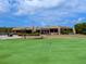 Community clubhouse with golf course views at 7360 Oak Moss Dr # 4, Sarasota, FL 34241