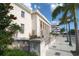 Classical-style building with columns and palm trees at 7360 Oak Moss Dr # 4, Sarasota, FL 34241