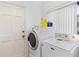 Laundry room with washer and dryer at 7360 Oak Moss Dr # 4, Sarasota, FL 34241