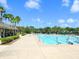 Community pool with swim lanes and ample deck space at 7758 Us Open Loop, Lakewood Ranch, FL 34202