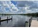 Scenic waterfront view with a dock for boat access and bridge views at 2910 122Nd E Ter, Parrish, FL 34219