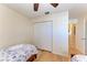 Bedroom featuring twin bed and closet for plenty of storage at 3607 E Bay Dr # 202, Holmes Beach, FL 34217