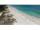 Expansive beach view from above, showing the shoreline and ocean at 4805 2Nd Ave, Holmes Beach, FL 34217