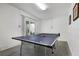 Finished basement with ping pong table at 4805 2Nd Ave, Holmes Beach, FL 34217