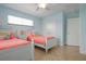 Light and airy bedroom with two twin beds at 4805 2Nd Ave, Holmes Beach, FL 34217