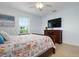 Bedroom with a queen bed and dresser at 4805 2Nd Ave, Holmes Beach, FL 34217