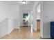 Bright hallway with tile flooring and access to bedrooms and bathroom at 4805 2Nd Ave, Holmes Beach, FL 34217