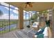 Relaxing screened balcony overlooking a lake and golf course at 6438 Watercrest Way # 204, Lakewood Ranch, FL 34202