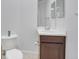 Small bathroom with single vanity and toilet at 6438 Watercrest Way # 204, Lakewood Ranch, FL 34202