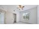 Bright bedroom with ceiling fan and large closet at 6438 Watercrest Way # 204, Lakewood Ranch, FL 34202