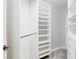 Large walk-in closet with ample shelving and hanging space at 6438 Watercrest Way # 204, Lakewood Ranch, FL 34202