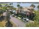 Watercrest community building near pool and lake at 6438 Watercrest Way # 204, Lakewood Ranch, FL 34202
