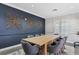 Modern community room with a large wooden table at 6438 Watercrest Way # 204, Lakewood Ranch, FL 34202