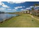 Scenic golf course view with lake and condos at 6438 Watercrest Way # 204, Lakewood Ranch, FL 34202