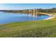 Golf course with lake and condo complex at 6438 Watercrest Way # 204, Lakewood Ranch, FL 34202