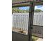 Private backyard with a white fence at 4160 Fruitville Rd # 13, Sarasota, FL 34232