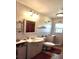 Updated bathroom with vanity and toilet at 4160 Fruitville Rd # 13, Sarasota, FL 34232