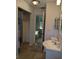 Clean bathroom with single vanity and shower at 4160 Fruitville Rd # 13, Sarasota, FL 34232