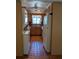 Efficient kitchen with ample cabinetry and tiled floor at 4160 Fruitville Rd # 13, Sarasota, FL 34232