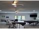 Large meeting room with tables, chairs, and a view of the outdoors at 4160 Fruitville Rd # 13, Sarasota, FL 34232