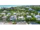 Aerial view of canal-front house near beach, showcasing its location at 562 Juan Anasco Dr, Longboat Key, FL 34228