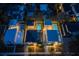 Aerial night view showcasing a cluster of modern homes, each with a private pool at 2430 Floyd St, Sarasota, FL 34239
