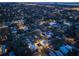 Night aerial view of a residential neighborhood with multiple houses and pools at 2430 Floyd St, Sarasota, FL 34239