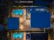 Nighttime aerial view of two houses with private pools and outdoor patio areas at 2430 Floyd St, Sarasota, FL 34239