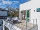 Private balcony offering scenic views and outdoor furniture at 2430 Floyd St, Sarasota, FL 34239