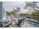 Relaxing balcony with outdoor seating overlooking the pool at 2430 Floyd St, Sarasota, FL 34239