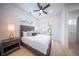 Comfortable bedroom with a queen-size bed and private balcony access at 2430 Floyd St, Sarasota, FL 34239