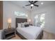 Charming bedroom with a queen bed and access to a private balcony at 2430 Floyd St, Sarasota, FL 34239